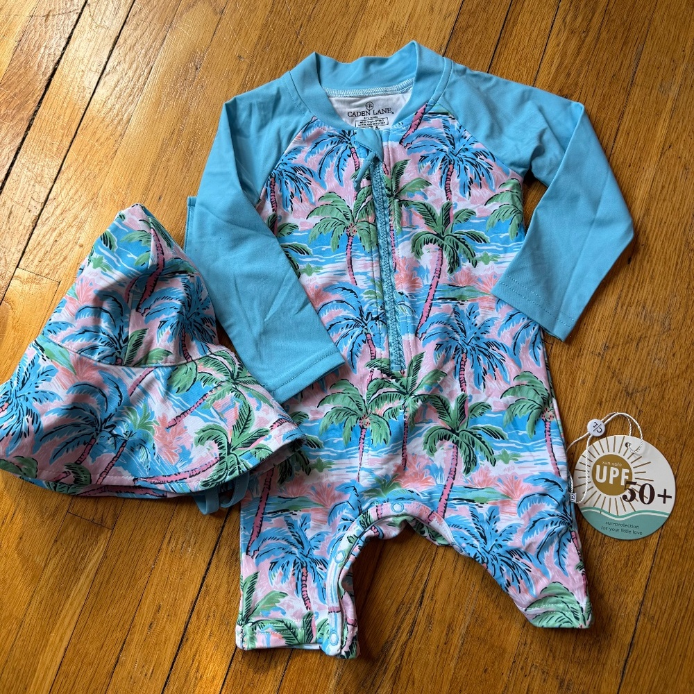 Caden Lane one-piece rash guard and hat set “pastel palms”